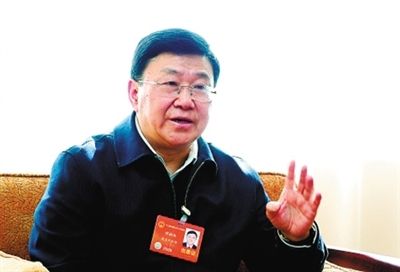 重慶市人大常委會(huì)副主任譚棲偉。